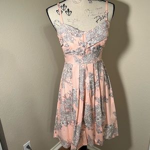 Maurice’s light peach dress with black and white floral pattern